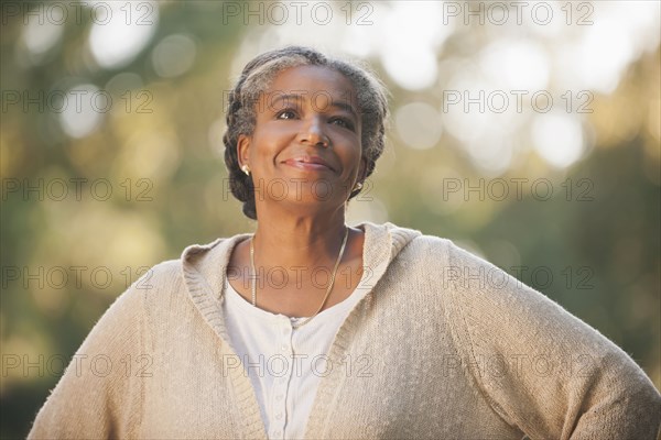 Smiling mixed race woman