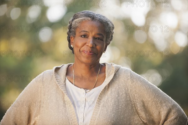 Smiling mixed race woman