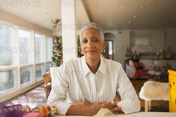 African American woman sitting at table