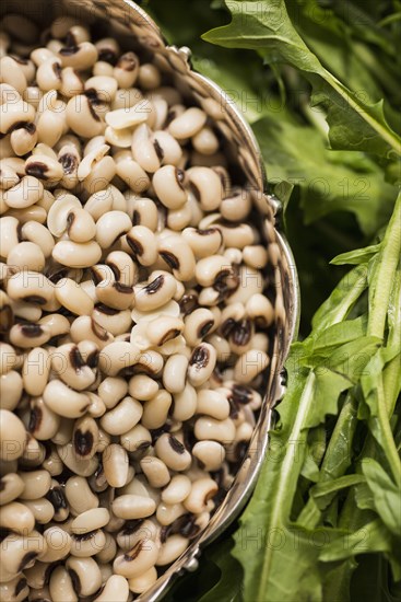 Close up of peas and lettuce leaves