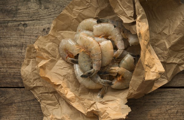 Raw shrimp in butcher paper