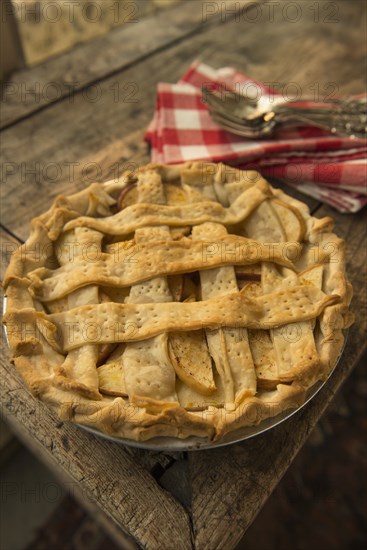 Apple pie on wooden table