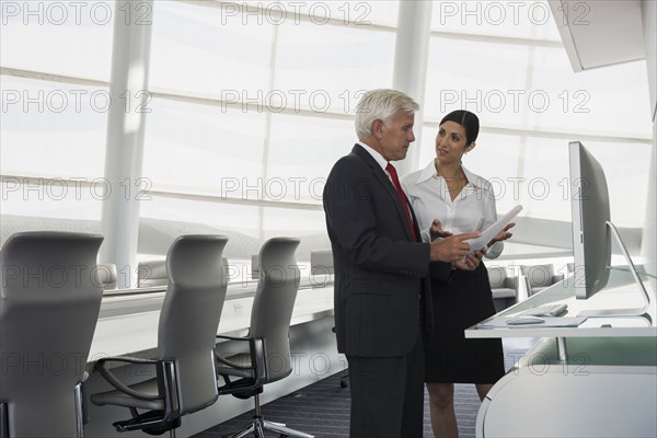 Business people talking in conference room