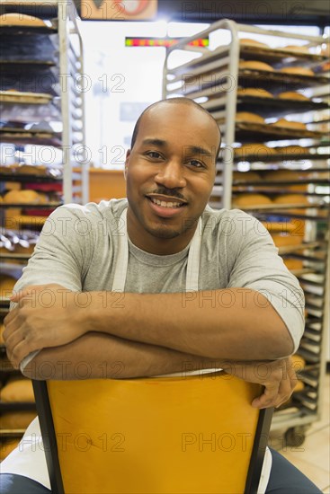 Black baker working in commercial kitchen