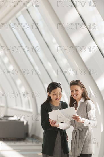 Businesswomen talking in lobby