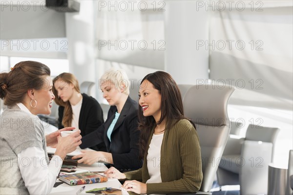 Businesswomen talking in meeting