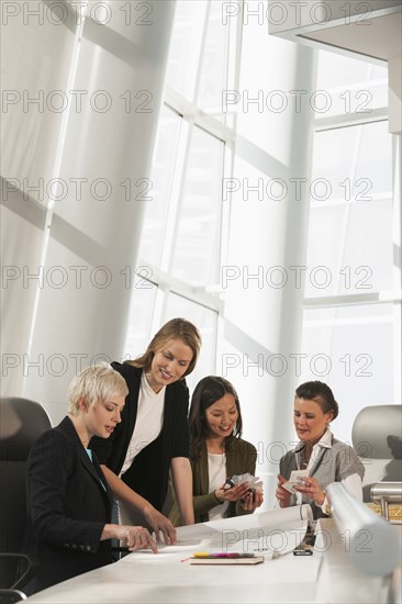 Businesswomen talking in meeting