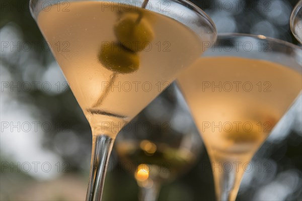 Close up of martinis with olives