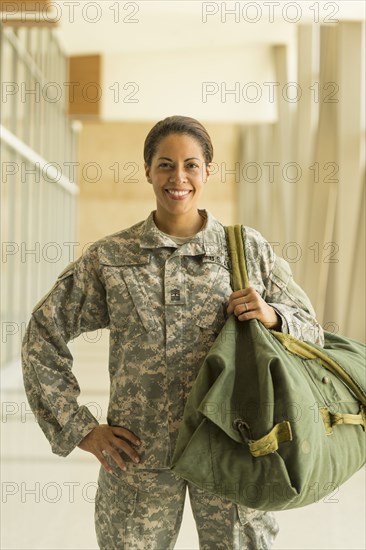 African American soldier smiling in airport
