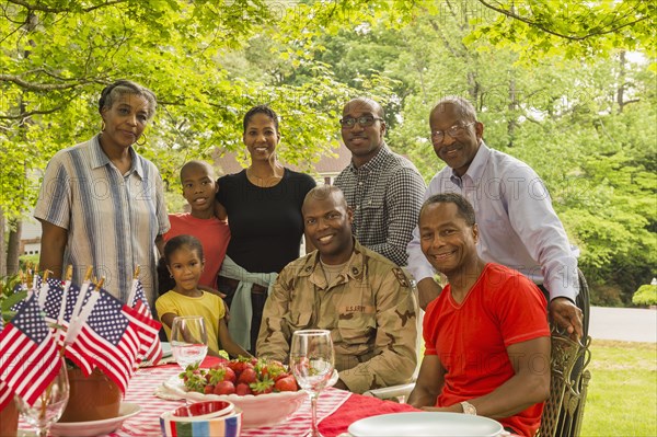 Portrait of smiling multi-generation family at picnic