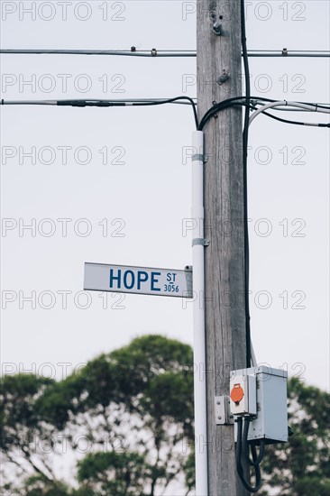 Hope street sign on utility pole