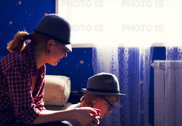 Caucasian women sitting together