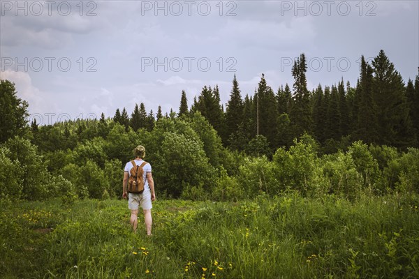 Man standing in rural field