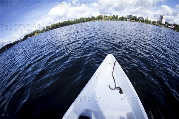 Rowboat floating in lake