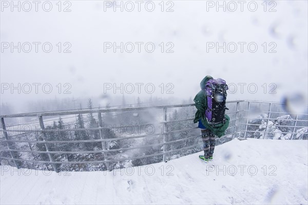 Caucasian hiker admiring scenic view