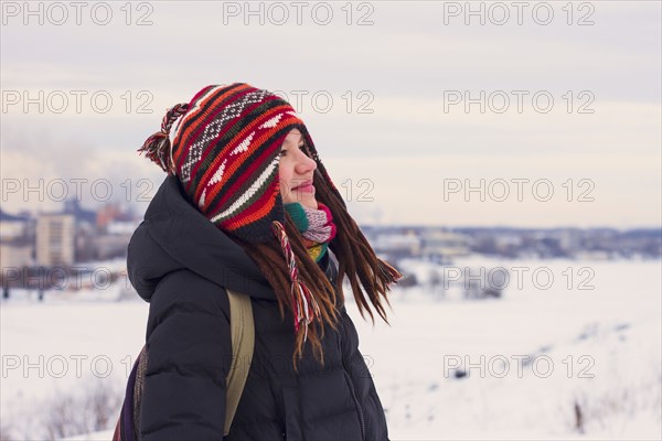 Caucasian woman admiring snowy landscape