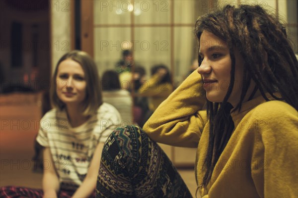 Caucasian women sitting in living room