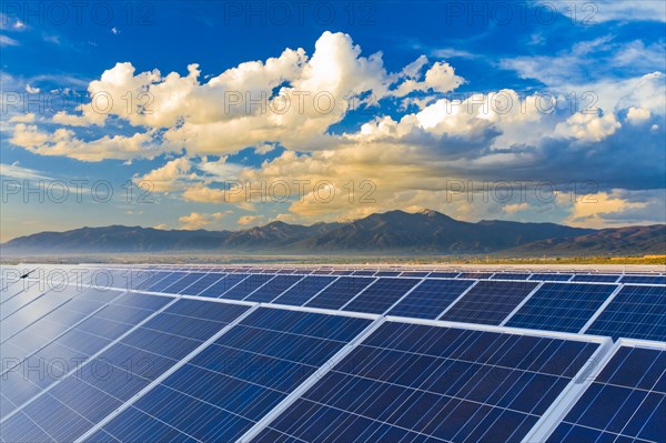 Mountains behind solar panels