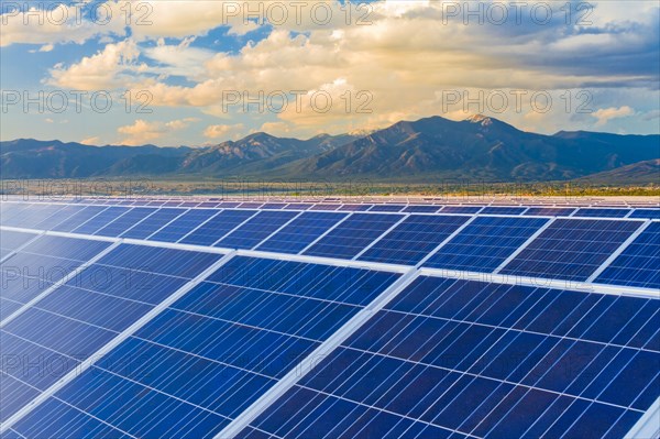 Mountains behind solar panels