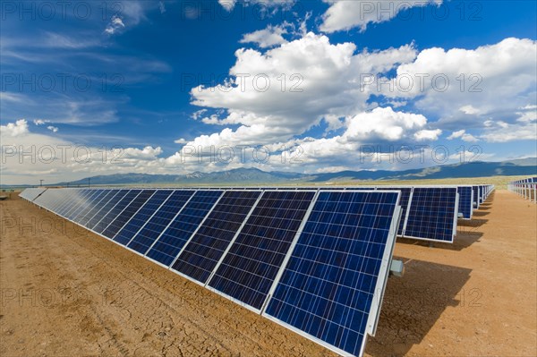 Blue sky over solar panels