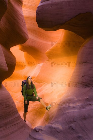 Persian woman hiking in canyon