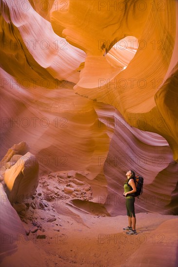 Persian woman hiking in canyon