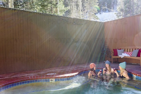 Women relaxing in hot tub