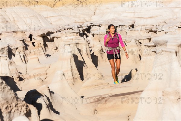 Native American woman hiking in desert
