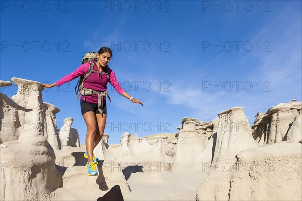 Native American woman hiking in desert