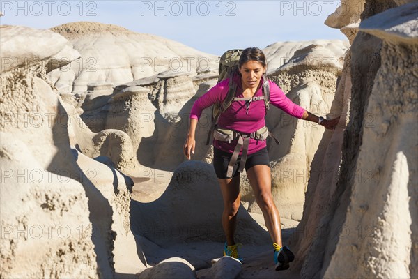 Native American woman hiking in desert