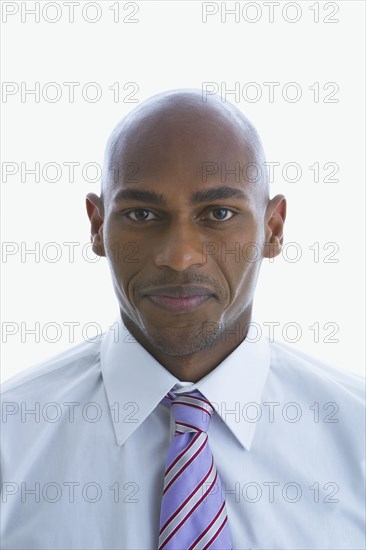 Mixed race businessman smiling