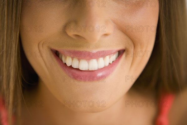 Mixed race woman smiling