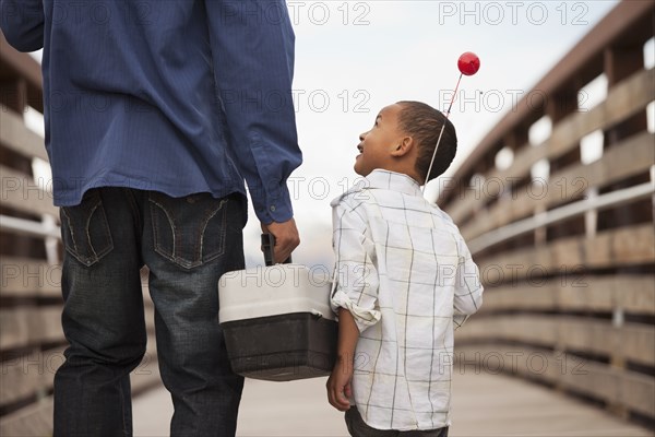 Father and son going fishing together