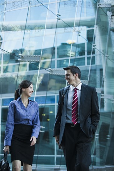 Caucasian business people walking together outdoors