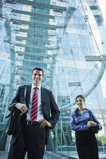 Caucasian business people standing outdoors