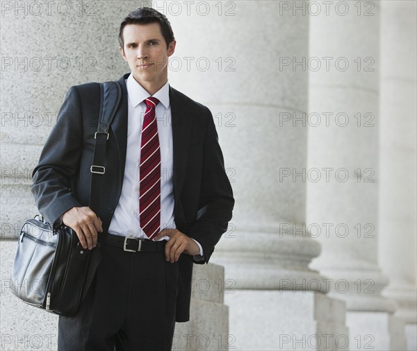 Caucasian businessman standing outdoors