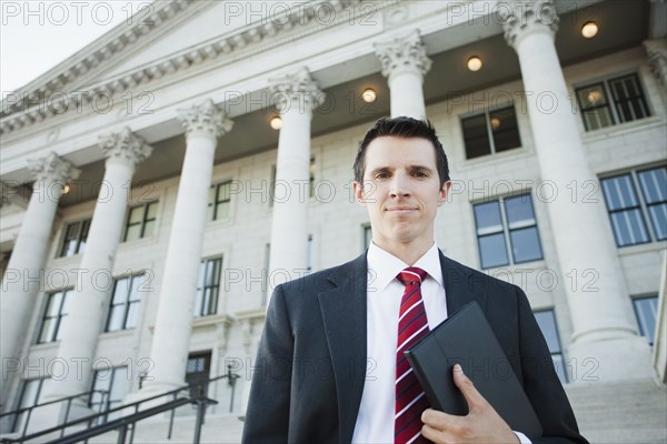 Caucasian businessman standing outdoors