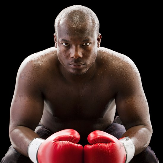 African American boxer wearing boxing gloves