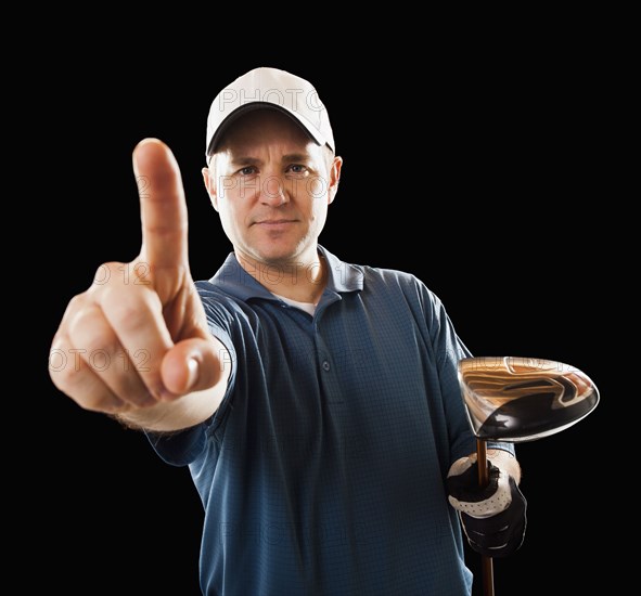 Caucasian golfer making Number 1 gesture