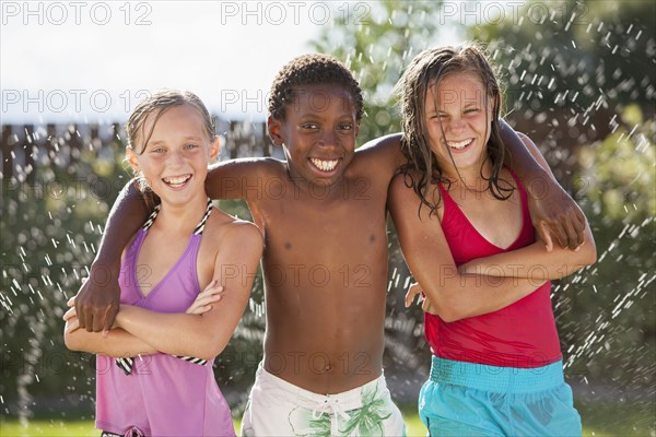 Friends playing in water