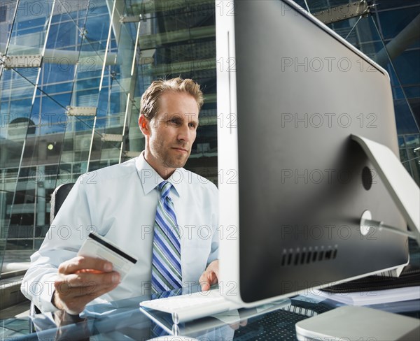 Caucasian businessman shopping online