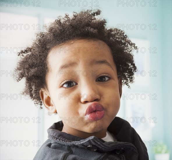 Close up of mixed race boy's face