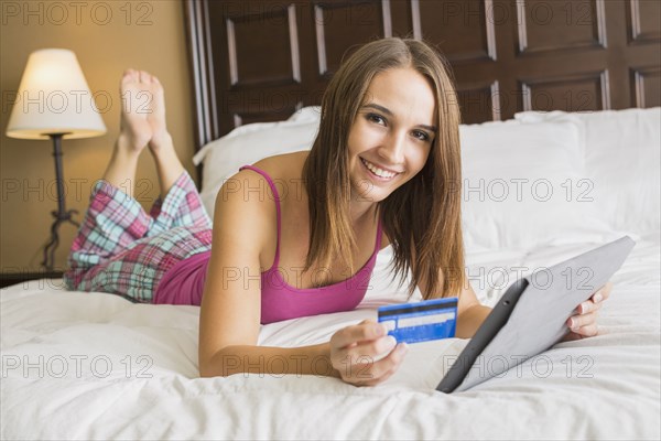 Caucasian woman shopping online with digital tablet