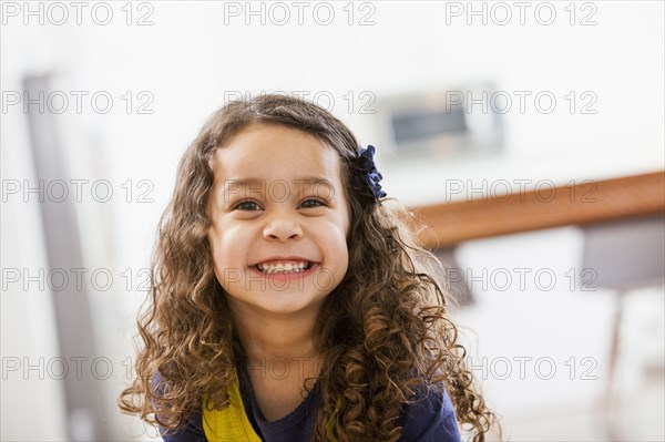 Mixed race girl smiling