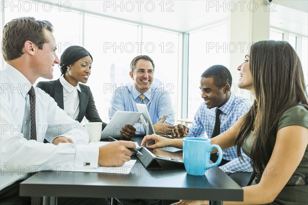 Business people talking in meeting