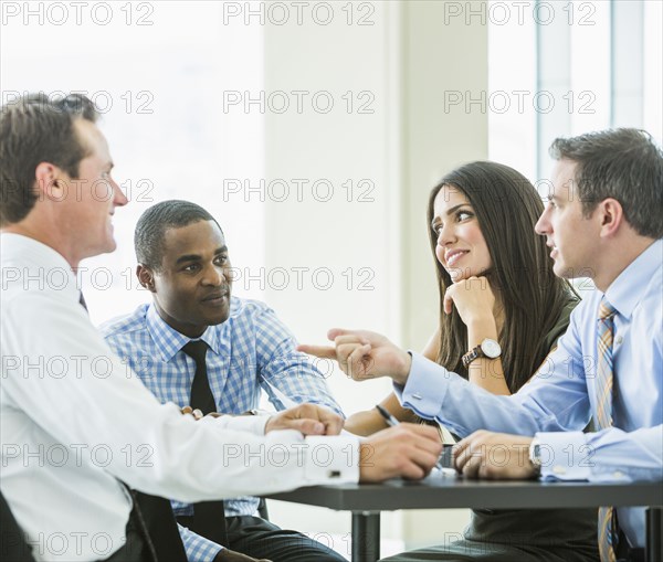 Business people talking in meeting