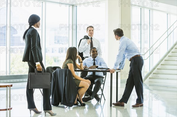 Business people talking in meeting