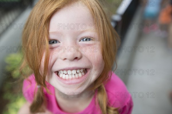 Close up of smiling Caucasian girl