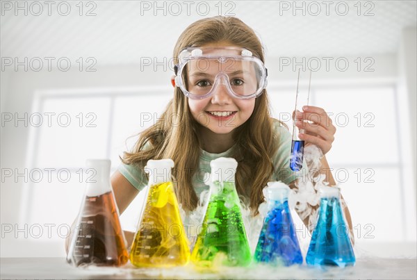 Caucasian girl doing science experiment