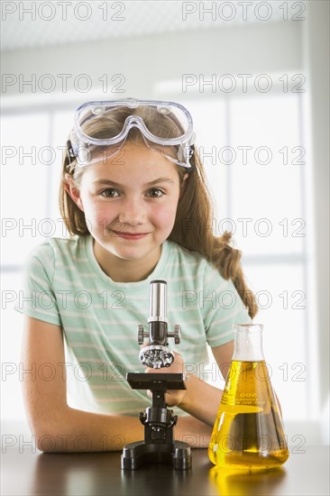 Caucasian girl doing science experiment